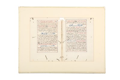 Lot 759 - THREE FOLIOS AND A CHAPTER HEADING OF POETIC AND QUR'ANIC MATERIAL