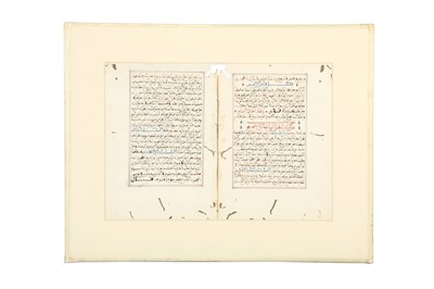Lot 759 - THREE FOLIOS AND A CHAPTER HEADING OF POETIC AND QUR'ANIC MATERIAL