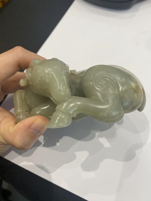 Lot 329 - A CHINESE PALE CELADON JADE CARVING OF A GOAT.