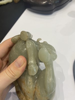 Lot 329 - A CHINESE PALE CELADON JADE CARVING OF A GOAT.