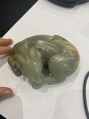 Lot 329 - A CHINESE PALE CELADON JADE CARVING OF A GOAT.