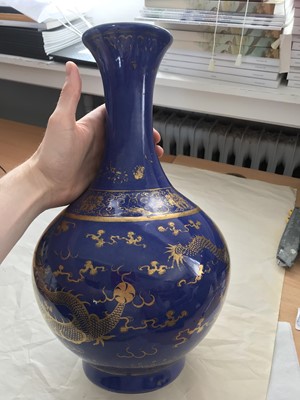 Lot 249 - A CHINESE POWDER-BLUE GILT-DECORATED 'DRAGON' BOTTLE VASE.