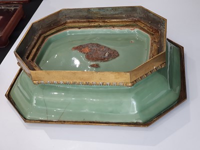 Lot 258 - A CHINESE CELADON-GLAZED GILT-MOUNTED TUREEN AND COVER.