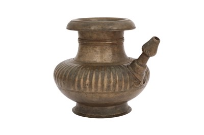 Lot 385 - A CEREMONIAL BRASS SPOUTED EWER (DHALACHA)
