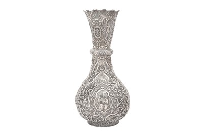 Lot 302 - AN ARMENIAN REPOUSSÉ SILVER VASE WITH CHRISTIAN ICONOGRAPHY