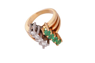 Lot 111 - An emerald and diamond dress ring