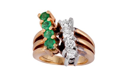 Lot 111 - An emerald and diamond dress ring