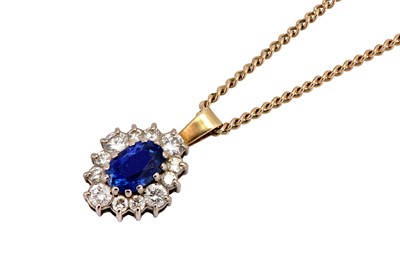 Lot 75 - A sapphire and diamond pendant