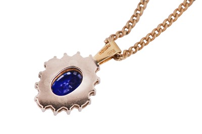 Lot 75 - A sapphire and diamond pendant