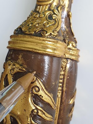 Lot 197 - A CHINESE GILT-BRONZE TOOL VASE.