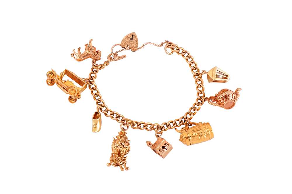 Lot 20 - A gold charm bracelet