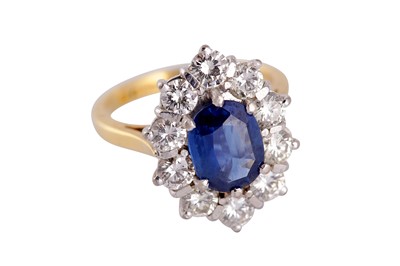Lot 74 - A sapphire and diamond cluster ring