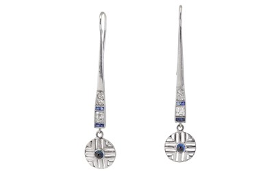 Lot 71 - A pair of diamond and sapphire pendent earrings