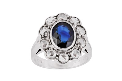 Lot 85 - A sapphire and diamond cluster ring