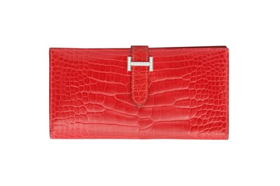 Lot 15 - λ Hermes Red Shiny Crocodile Bearn Wallet
