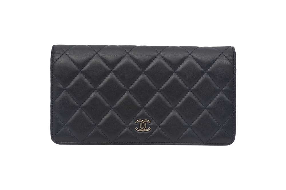 Lot 177 - Chanel Navy Classic Bi-Fold Long Wallet