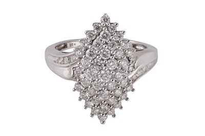 Lot 207 - A diamond dress bombé ring