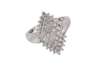 Lot 207 - A diamond dress bombé ring