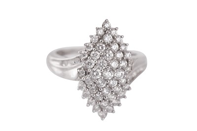 Lot 207 - A diamond dress bombé ring