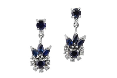Lot 69 - A pair of sapphire and diamond pendent earrings