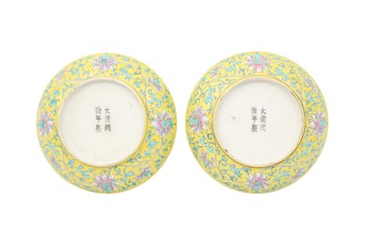 Lot 320 - A PAIR OF CHINESE FAMILLE ROSE YELLOW-GROUND 'LOTUS' DISHES.