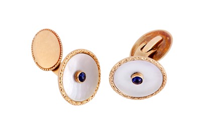 Lot 80 - A pair of mother of pearls and sapphire cufflinks
