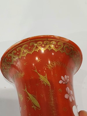 Lot 326 - A CHINESE GILT-DECORATED SALMON-RED 'FISH' VASE.