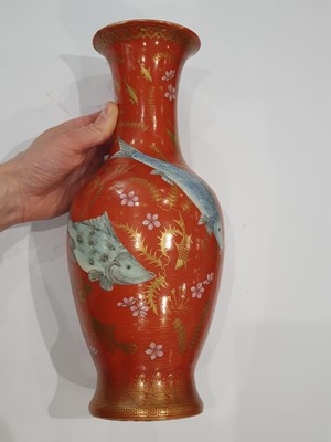 Lot 326 - A CHINESE GILT-DECORATED SALMON-RED 'FISH' VASE.