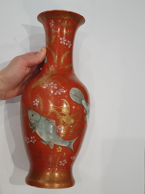 Lot 326 - A CHINESE GILT-DECORATED SALMON-RED 'FISH' VASE.