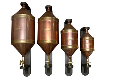 Lot 364 - A SET OF FOUR LATE 19TH CENTURY GRADUATED COPPER AND BRASS WALL MOUNTED LIQUID MEASURES