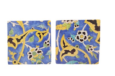 Lot 412 - FOUR SAFAVID CUERDA SECA POTTERY TILES WITH FLORAL SPRAYS