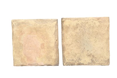 Lot 412 - FOUR SAFAVID CUERDA SECA POTTERY TILES WITH FLORAL SPRAYS