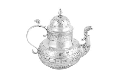 Lot 309 - An early 18th century Dutch silver teapot, Groningen 1735 by Helprich Ritzema