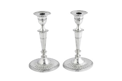 Lot 534 - A pair of Victorian sterling silver candlesticks, Sheffield 1898 by Hawksworth, Eyre & Co Ltd