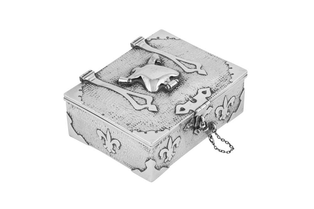 Lot 437 - An Edwardian ‘Arts and Crafts’ sterling silver cigarette box, Birmingham 1903 by John William Barrett