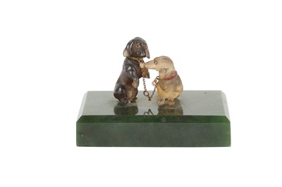 Lot 245 - A LATE 20TH CENTURY CARVED HARDSTONE MODEL OF TWO DACHSHOUNDS