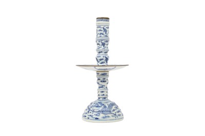 Lot 690 - A CHINESE BLUE AND WHITE SECTIONAL 'DRAGON' CANDLE STICK.