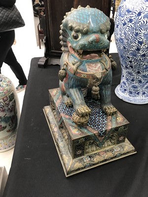 Lot 267 - A CHINESE CLOISONNÉ ENAMEL MALE BUDDHIST LION DOG AND STAND.