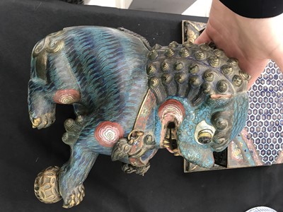 Lot 267 - A CHINESE CLOISONNÉ ENAMEL MALE BUDDHIST LION DOG AND STAND.