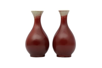 Lot 81 - A PAIR OF CHINESE COPPER RED-GLAZED VASES.