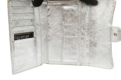 Lot 576 - Chanel Metallic Silver Long Reissue Flap Wallet