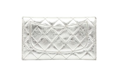 Lot 576 - Chanel Metallic Silver Long Reissue Flap Wallet