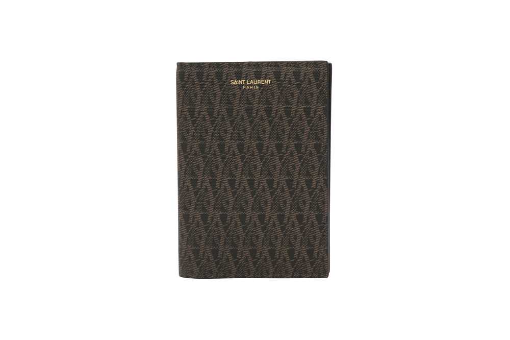 Lot 554 - Saint Laurent Black Toile Monogram Passport