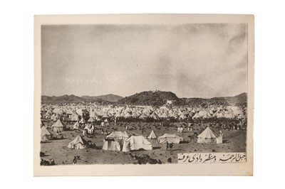 Lot 444 - A GROUP OF HAJJ-RELATED SOUVENIRS AND A TRAVEL POSTCARDS ALBUM