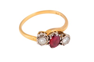 Lot 99 - A ruby and diamond three-stone ring