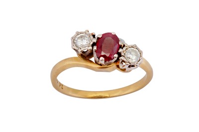 Lot 99 - A ruby and diamond three-stone ring