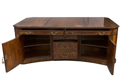 Lot 110 - A THEODORE ALEXANDER FIGURED MAHOGANY PARTNERS DESK