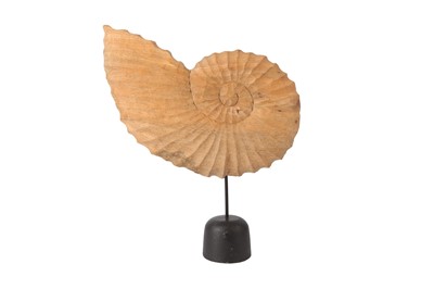 Lot 443 - A CARVED WOODEN SCULTPURE OF AN AMMONITE