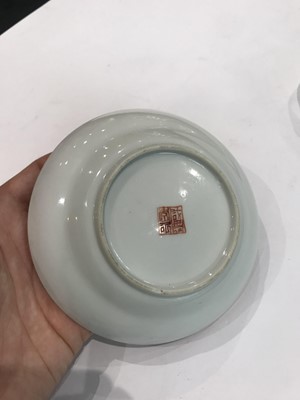 Lot 490 - A CHINESE FAMILLE ROSE FIGURATIVE OGEE SAUCER DISH.