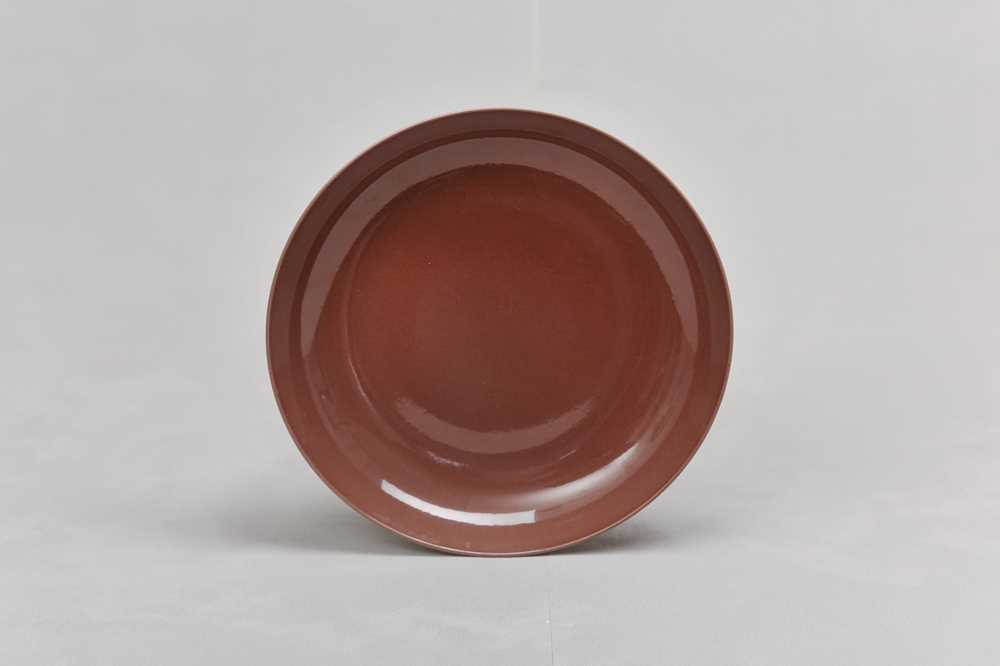 Lot 102 - A CHINESE COPPER RED-GLAZED DISH.